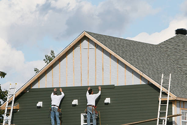 Professional Siding Contractor technician working in Williamsfield, OH